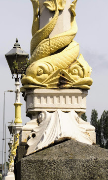 Why visit Belfast from Dublin: fish lampposts on the River Lagan