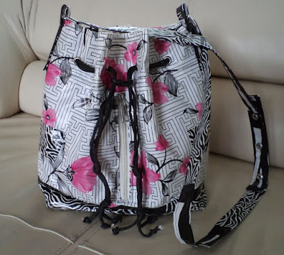 Repairing my waxcloth bucket bag with duct tape