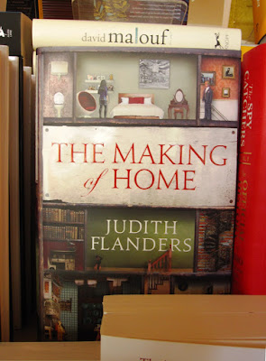 A copy of the book 'The Making of Home' on display in a book shop.