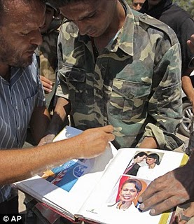 Ghadaffi Obsessed With Miss Condollezza Rice! 2