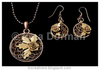 Quilled jewelry: pendant and earrings
