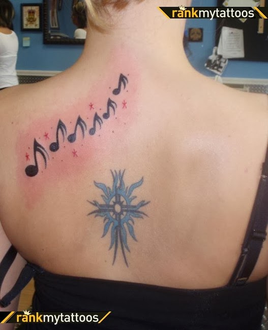 Tattoos of stars and music notes