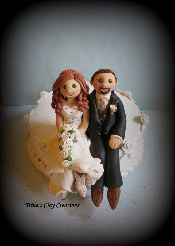 https://www.etsy.com/listing/204245624/wedding-cake-topper-custom-cake-topper?ref=shop_home_active_1&ga_search_query=bride%2Band%2Bgroom%2Bsitting%2Bon%2Bcake
