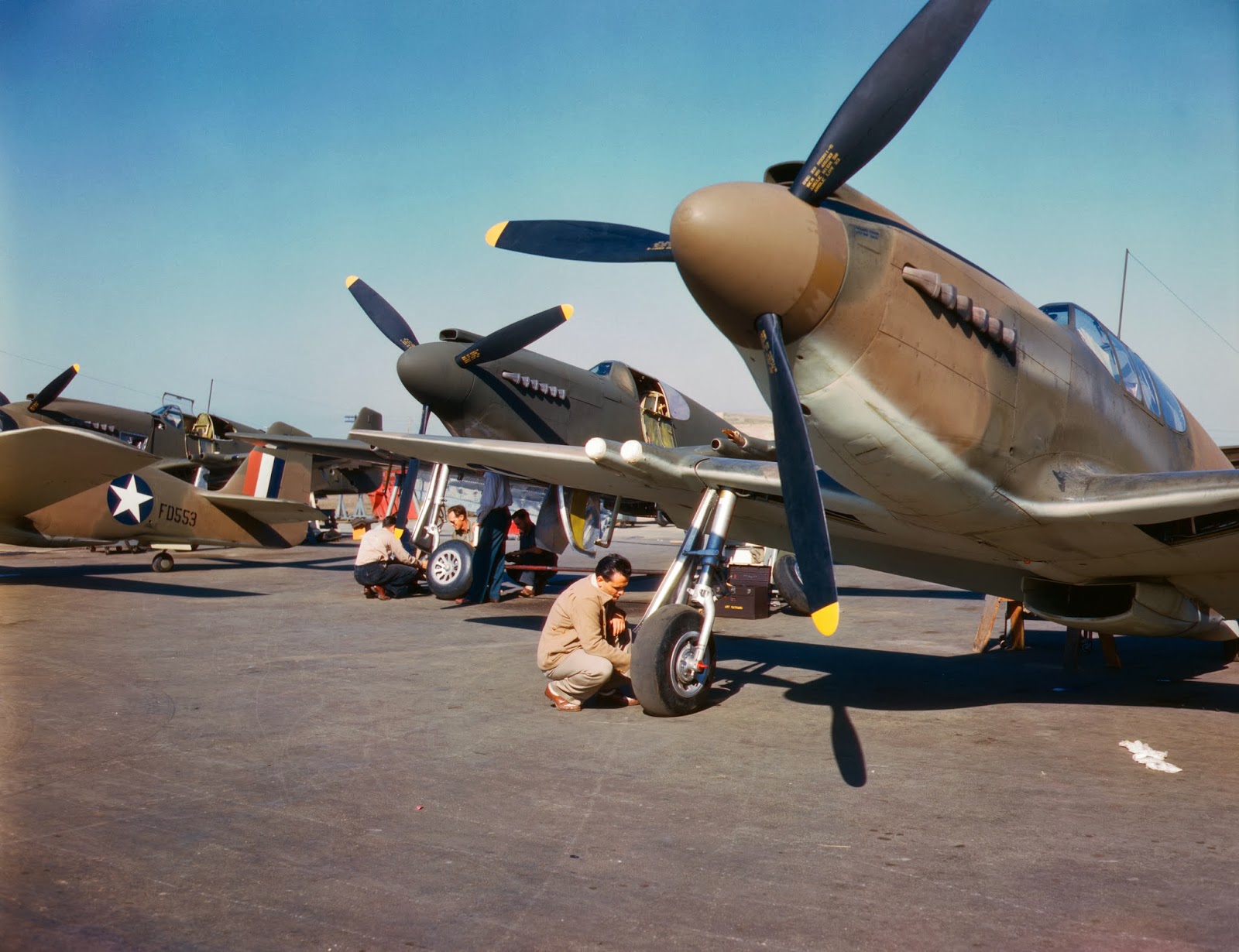 P-51+fighter+planes+being+prepared+for+test+flight+at+the+field+of+the+North+American+Aviation,+Inc.,+plant+in+Inglewood,+Calif.jpg
