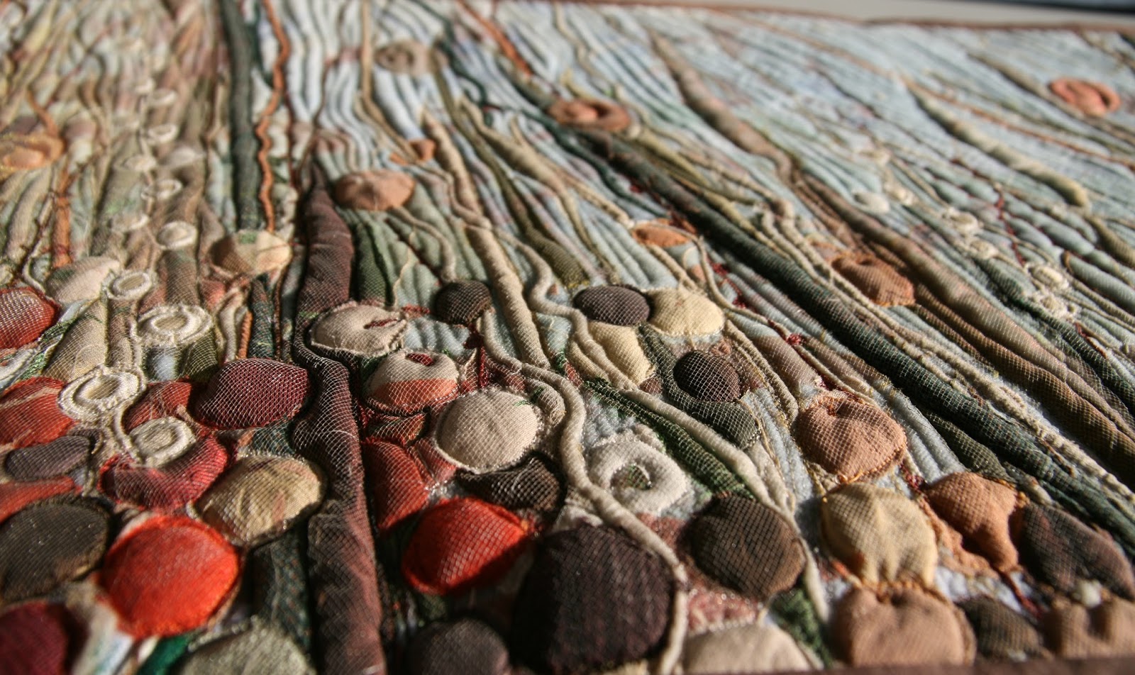 Patchworki Anny Sławińskiej: Pomarańczowa łąka