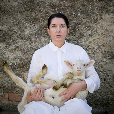 Portrait with White Lamb from the series Back to Simplicity