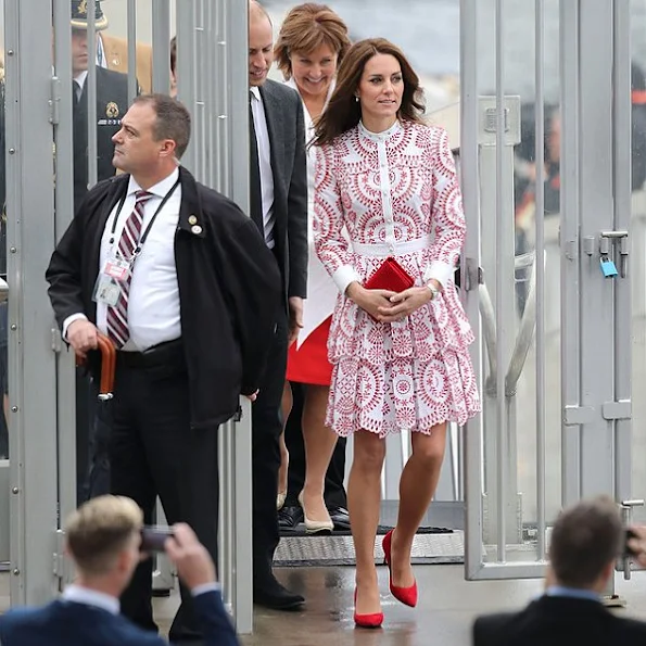 Kate Middleton wore Alexander McQueen red white patterned dress, clutch, shoes, red pumps