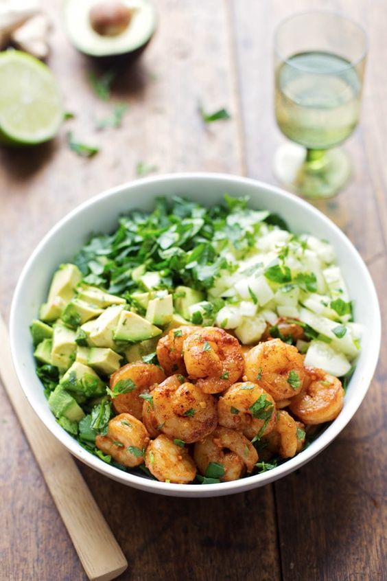 This spicy shrimp and avocado salad has cucumbers, spinach, shrimp, and avocado with a creamy miso dressing. Awesome healthy lunch!