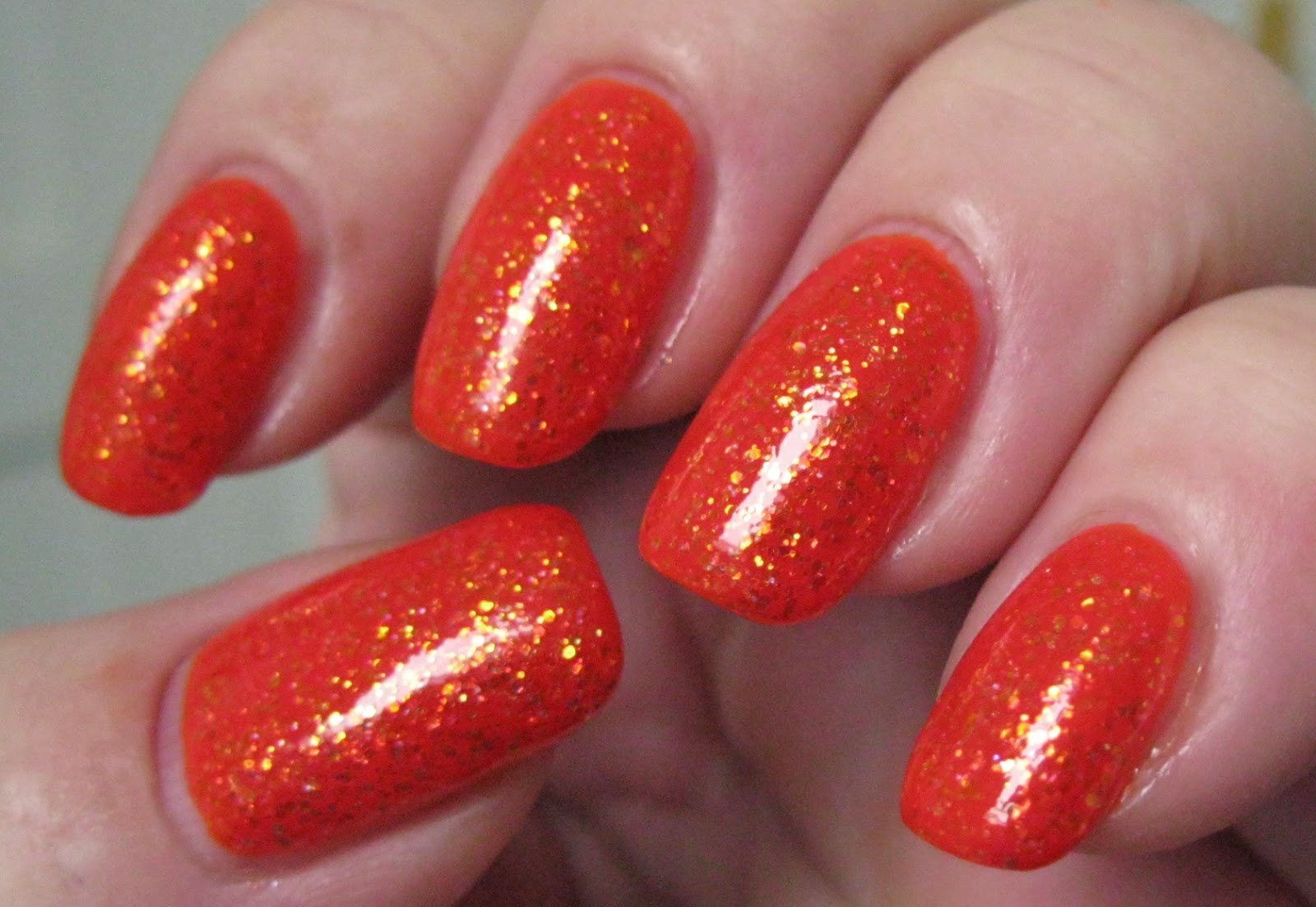 10. Orly Nail Lacquer in "Orange Punch" - wide 8