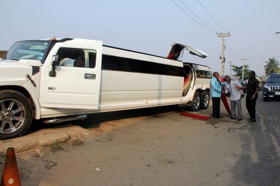 8 Photos: Lagos pastor, Tom Samson, his hummer Limo and red carpet spotted in Lagos