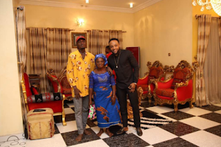 Shoe-rack hawker returns with mum after 16-months to thank singer Kcee for changing his life