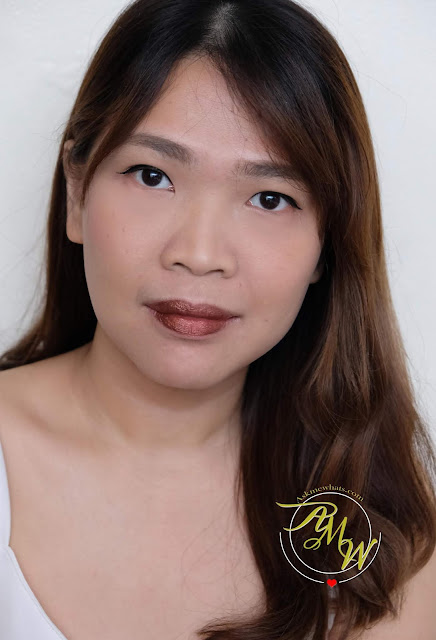 a photo of The Body Shop Shine Lip Liquid lipsticks Review in shades Lemon Sherbet, Blueberry Chew, Russet Copper and Black Liquorice by Nikki Tiu of www.askmewhats.com