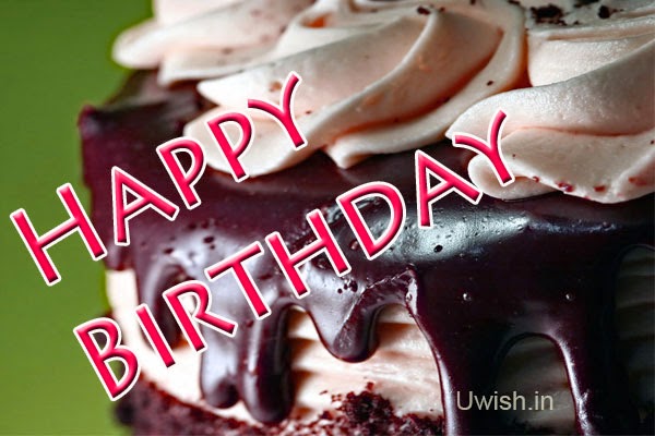 Happy birthday  e greetings and wishes, with delicious chocolate cream cake.