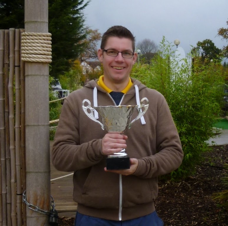 Surrey Invitational Minigolf Tournament second-round winner 'Squire' Richard Gottfried poses with the S.I.T. cup at Jungle Island Adventure Golf in Epsom Surrey Invitational Minigolf Tournament second-round winner 'Squire' Richard Gottfried poses with the S.I.T. cup at Jungle Island Adventure Golf in Epsom