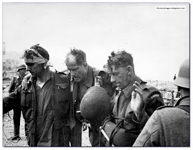 Three Canadian soldiers captured  by the Germans during the Dieppe Raid