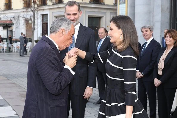 Queen Letizia wore a new flare striped cocktail dress by Carolina Herrera