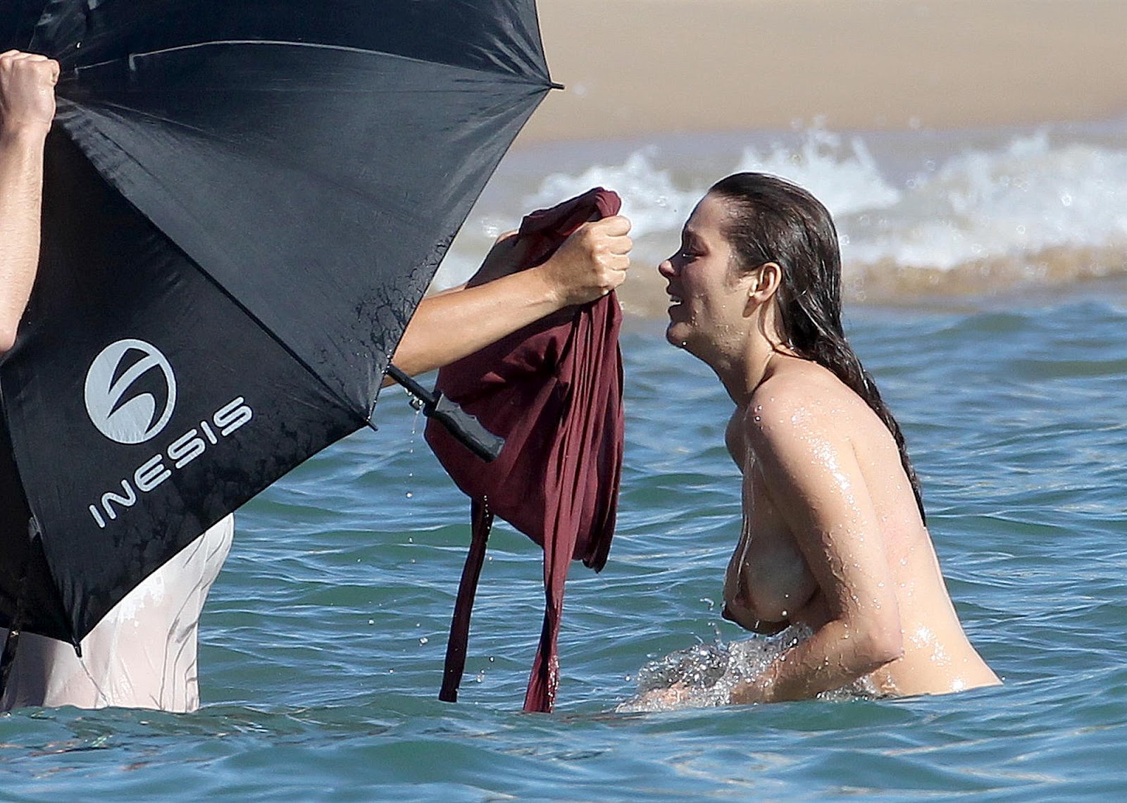Marion Cotillard showing off her big boobs on a movie set in Cannes! 