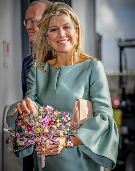 Honorary chair of the King Willem I foundation. Queen Maxima wore a silk-satin dress by Belgian fashion house Natan