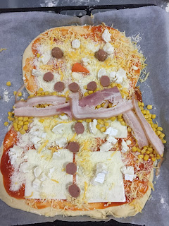 Pizza de muñeco de nieve