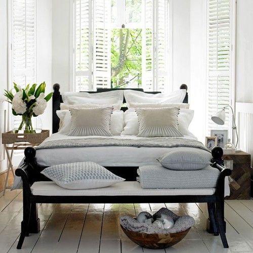 Beautiful room with white plantation shutters