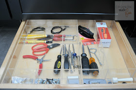 Toekick drawer organized used as junk drawer :: OrganizingMadeFun.com