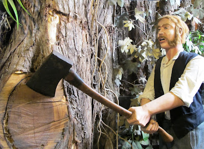 Full-scale model of a wood cutter at Tawhiti Museum