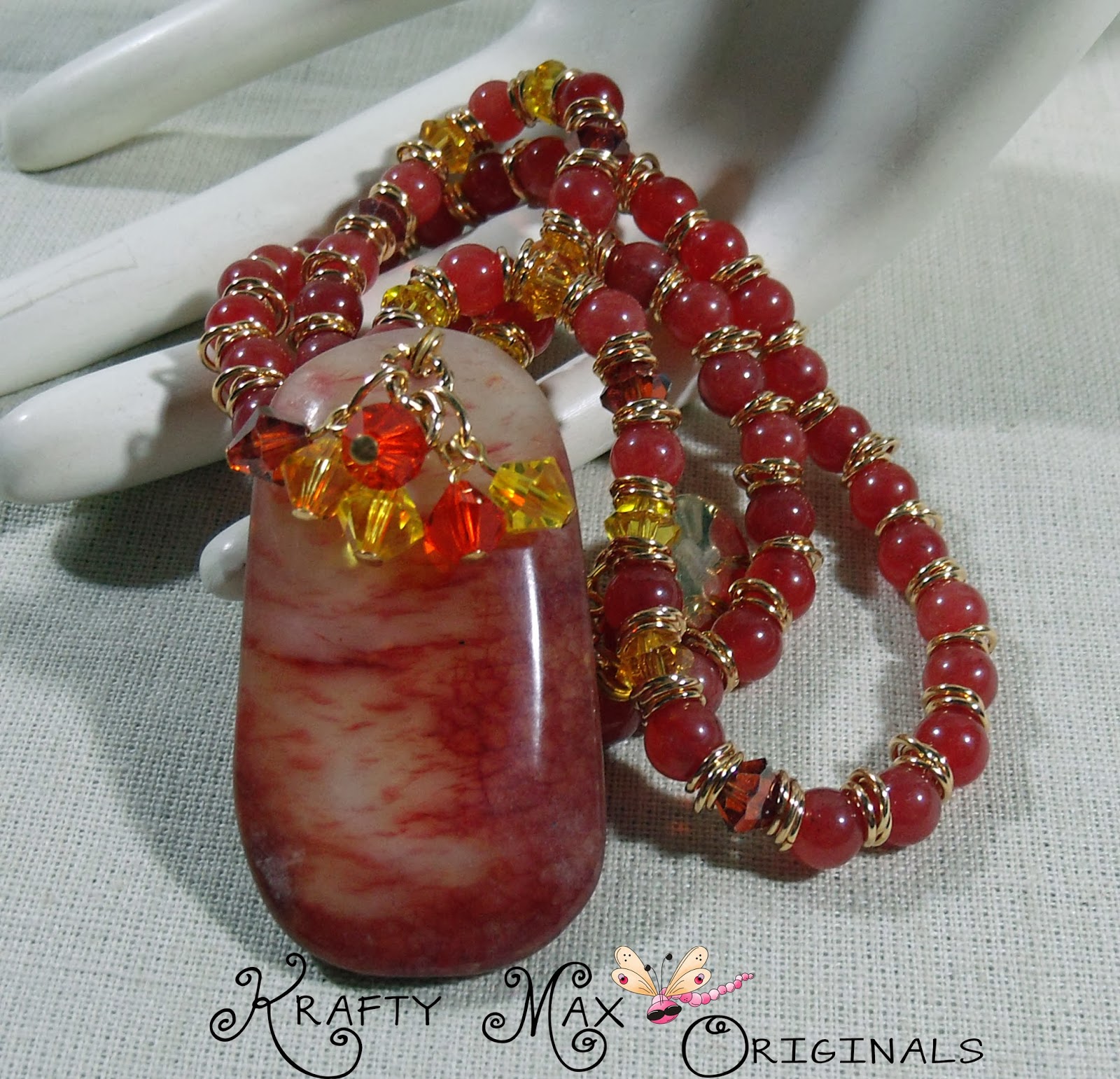 http://www.lajuliet.com/index.php/2013-01-04-15-21-51/ad/gemstone,92/exclusive-bloodstone-and-swarovski-crystal-golden-necklace-set-a-krafty-max-original-design,143