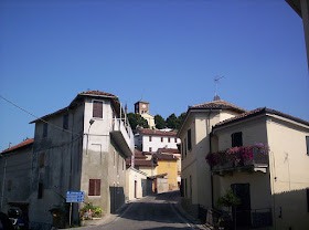 The hilltop village of Grazzano Badoglio, with the former Abbey of Aleramica visible at the top 