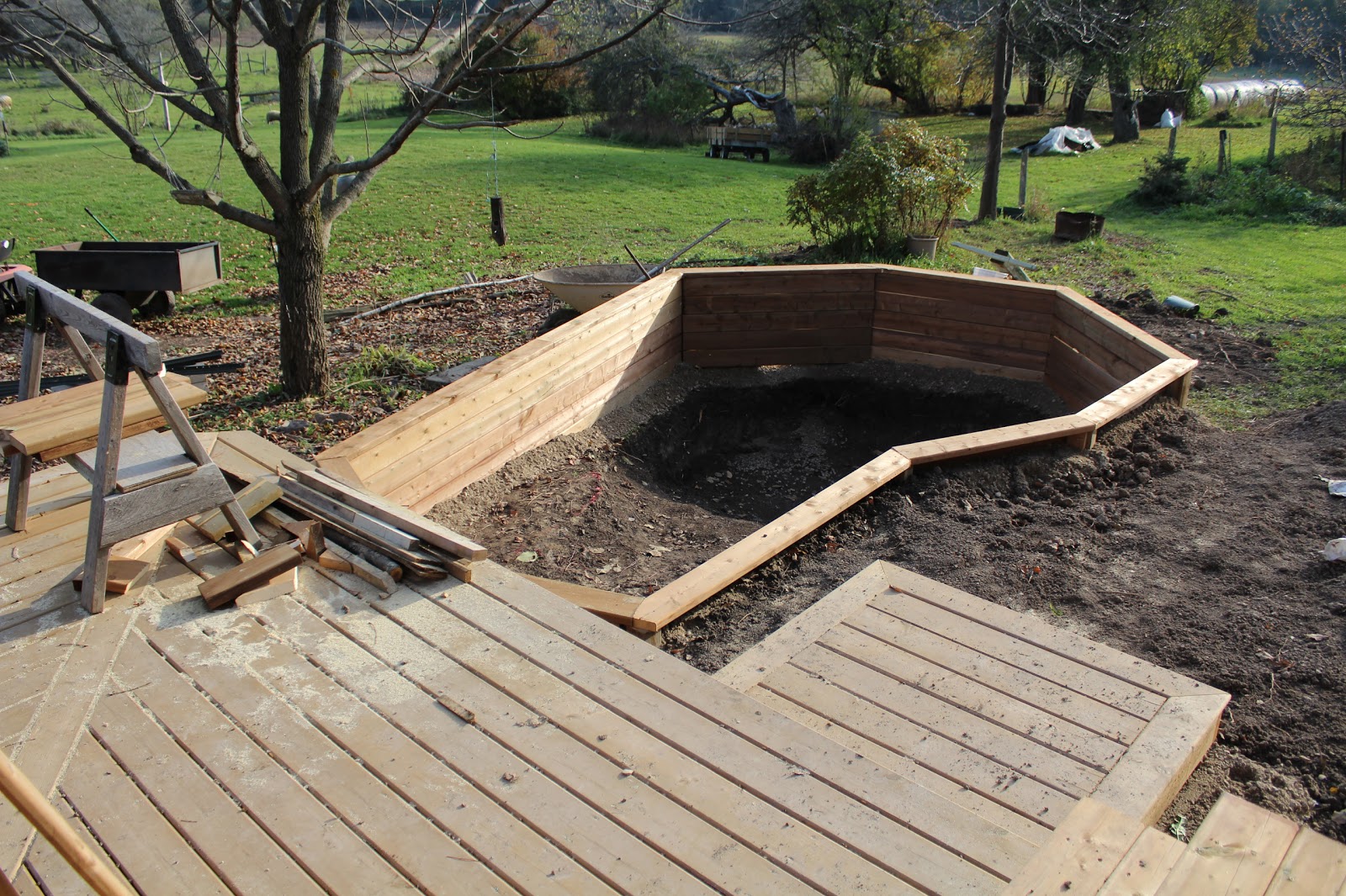 koi_pond_building_ideas_raised_pond_with_waterfall.jpg