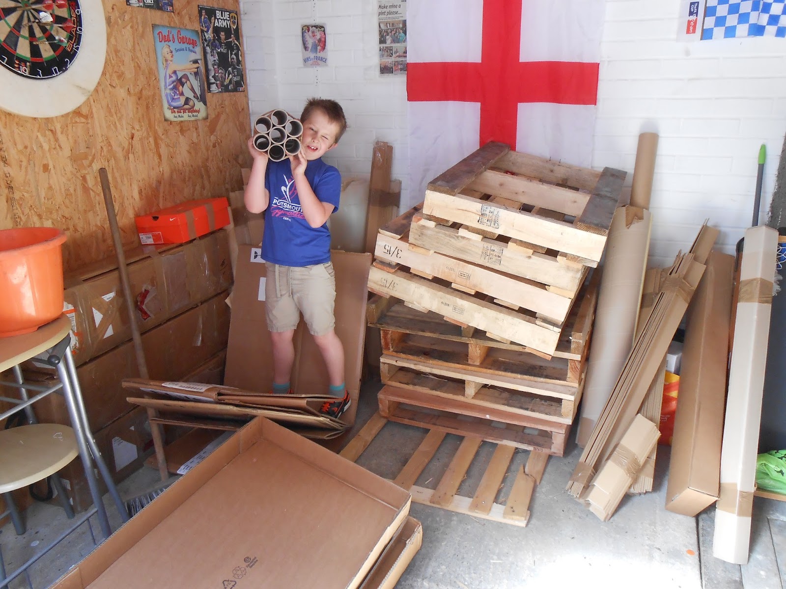 broken pallets and cardboard boxes wood and cardboard for scout campfire