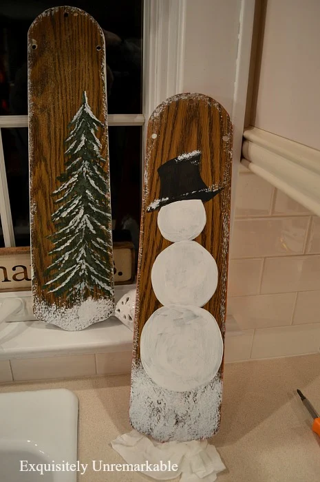 Recycled fan blades with Christmas tree and snowman painted on front