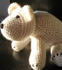 http://www.ravelry.com/patterns/library/polar-bear-amigurumi-doll