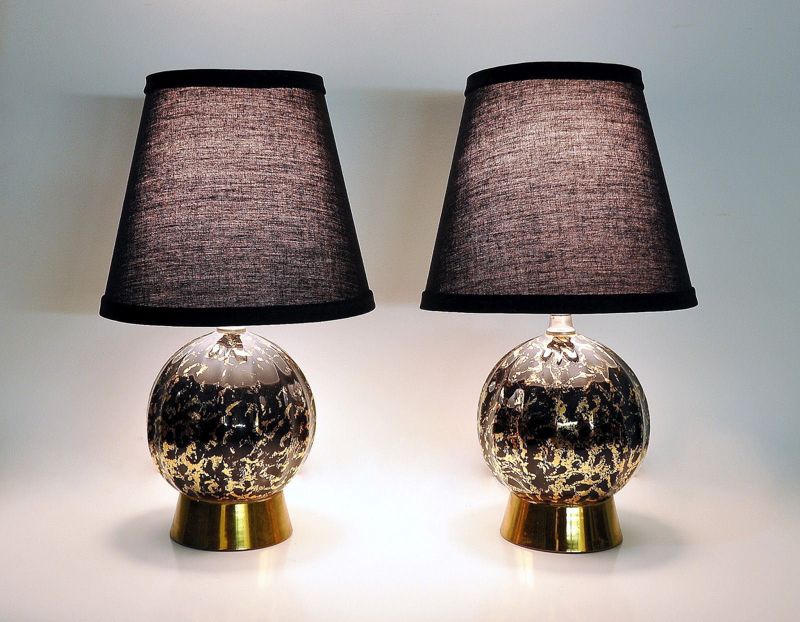SELECT MODERN Pair of Hollywood Regency Black and Gold Ceramic Brass