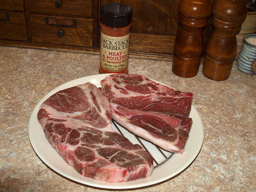 Pellet Smoker Cooking Grilled Pork Steaks, Fried Hash Browns and