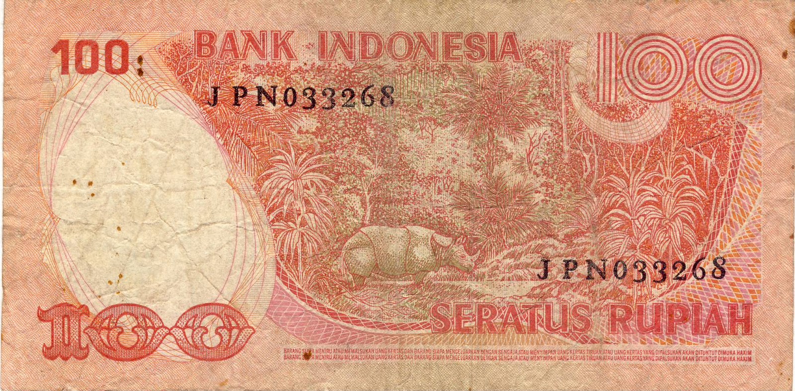 Uang Kertas Rp 100 Seratus Rupiah Indonesia Bergambar Badak Jawa