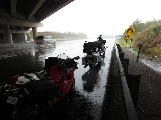 Motorcycles waiting out the rain in Pennsylvania.