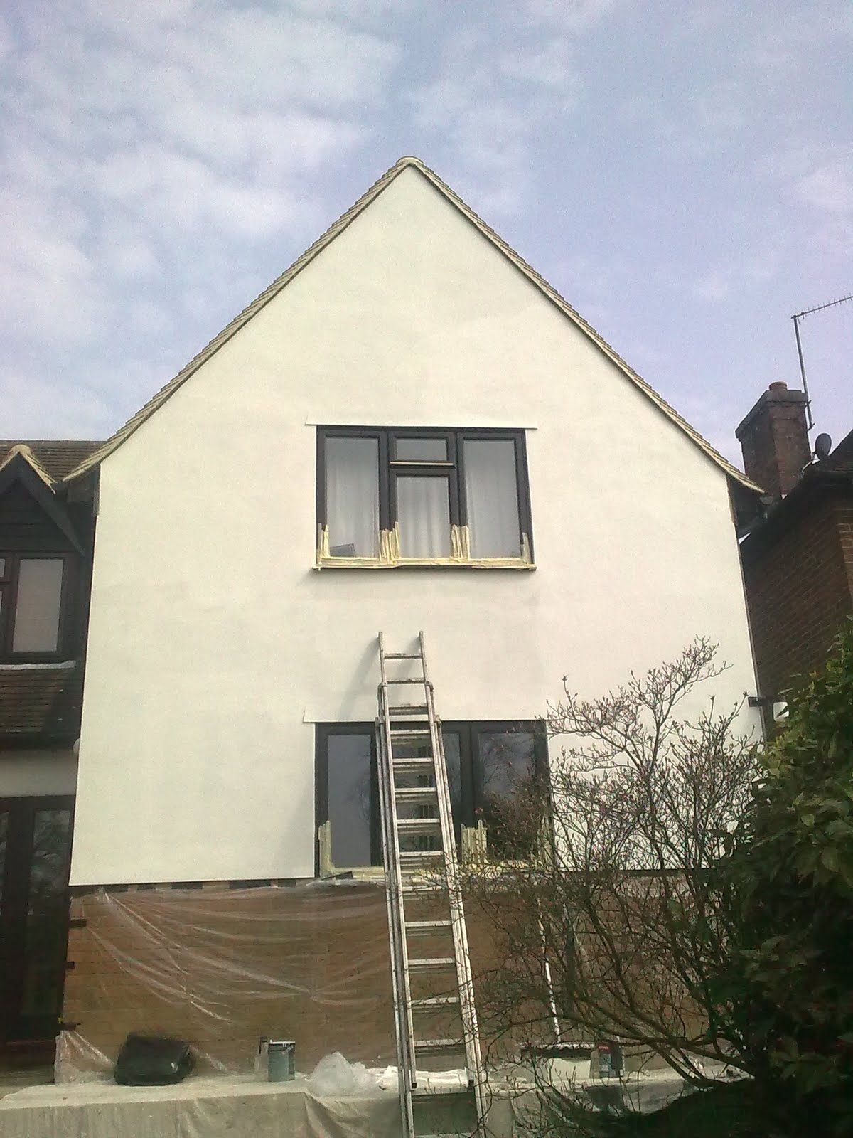 N.W. DECORATING Exterior rendering Johnstone's Pliolite Masonry Paint