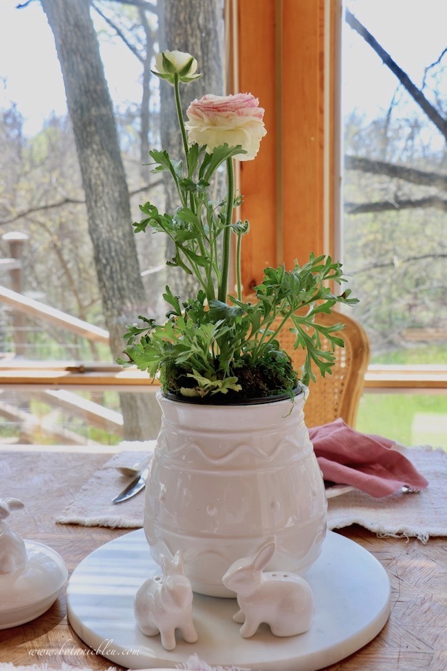 Easter tablesetting pink ranunculus centerpiece
