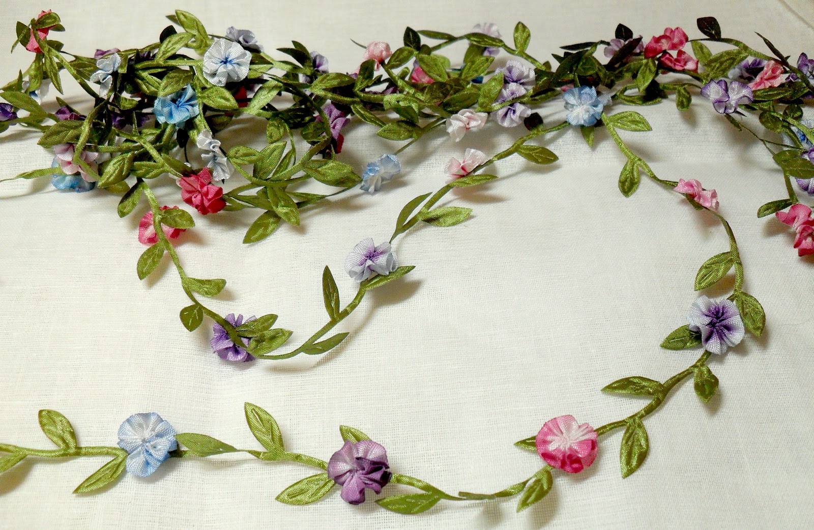 Lambs and Ivy Designs Lots of little ribbon flowers