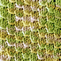 Pangolin Scales Knitting Sttich in the round. Easy stitch pattern with a 4-row repeat.