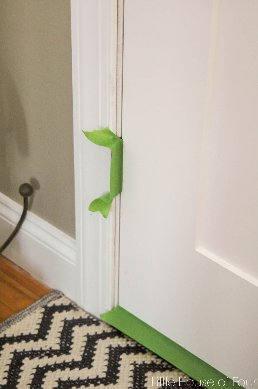 Updating the entryway with Sherwin Williams Iron Ore Little House of