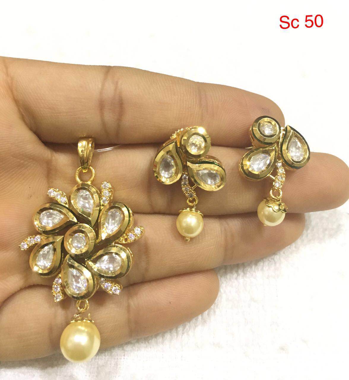Pick Any Locket with Earrings 1100 Rupees Jewellery Designs