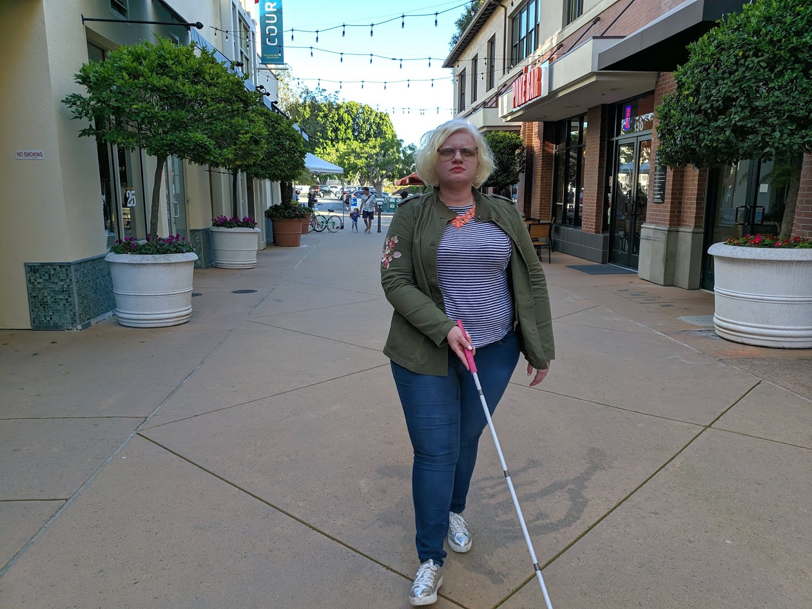Legally blind and using a white cane