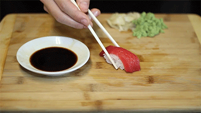 Image result for dipping sushi in soy sauce gif