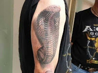 Snake With Red Eyes Tattoo