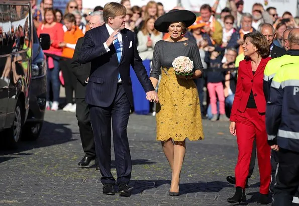 Governor of Rhineland-Palatinate Malu Dreyer and her Husband Klaus Jensen. Queen Maxima wore Natan wool top and yellow lace skirt. visit Germany