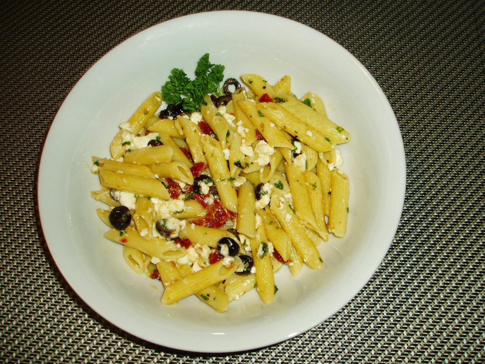 Meatless Mediterranean Penne with SunDried Tomatoes, Black Olives