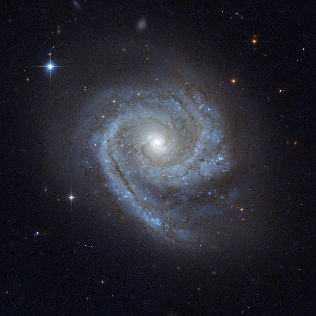 Galaxy ESO 498-G5: a Spiral within a Spiral!