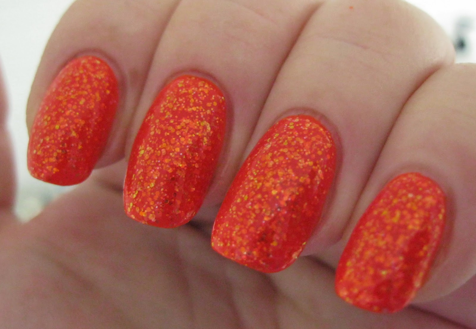 10. Orly Nail Lacquer in "Orange Punch" - wide 4
