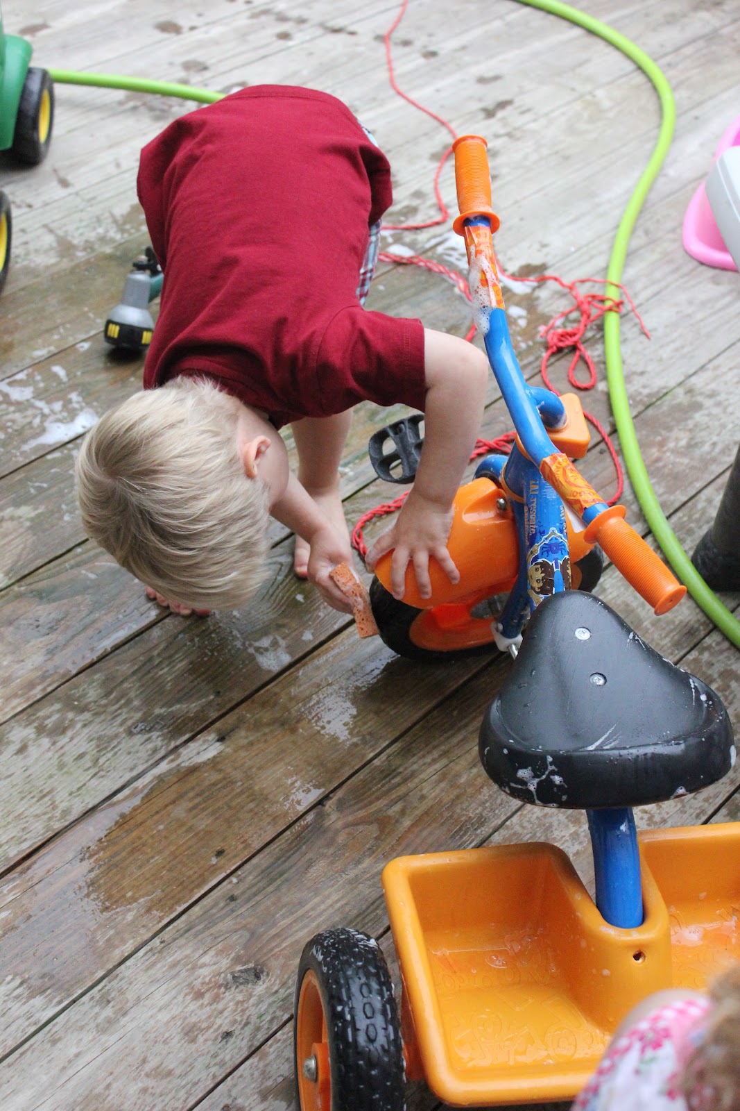 Momma's Fun World Car wash fun with Tricycle